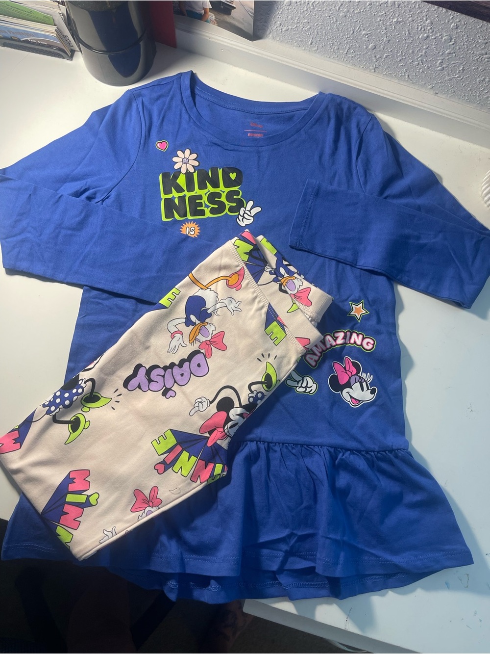 Girls Disney outfits.